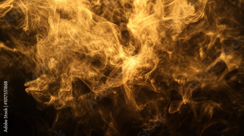 Beauty gold smoke on dark background movement golden of smoke on fire flame abstract and texture of amazing magic golden smoke on black background