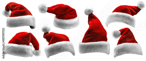 Set of isolated red Santa Claus hats. Collection of bright contrasting hats