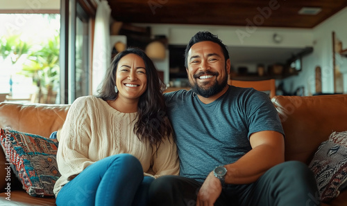 Happy Maori couple sits comfortably in a cozy living light room, generated ai