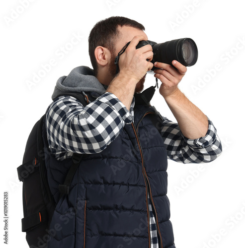 Photographer with backpack and camera taking picture on white background