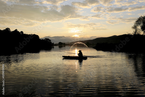 Early in the morning a fisherman on Upo Wetland, Changnyeong-gun, Gyeongsangnam-do, Korea - October 19, 2019: The largest natural swamp in Korea. In 1997 it was designated as an RAMSAR wetland.