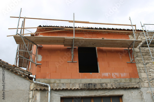 Surélévation de maison en brique