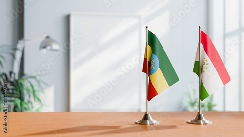 FLAGS OF ETHIOPIA AND TAJIKISTAN ON TABLE