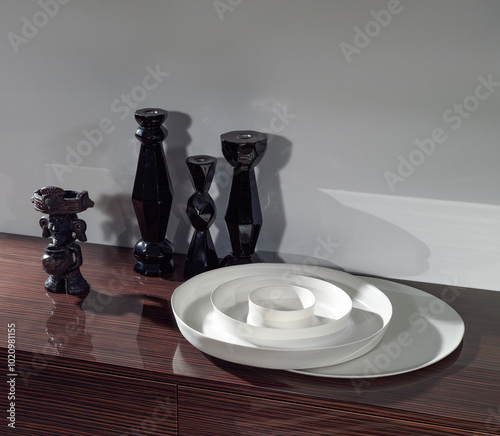 Tray and candlesticks on a wenge top