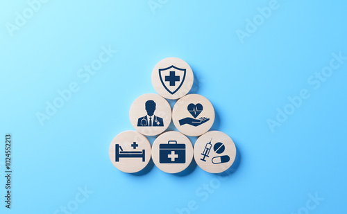 Health insurance and medical care concept. A set of wooden blocks displaying health-related icons, medical care, health insurance, and medication. healthcare services, protection, insurance coverage,