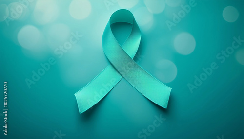 Teal ribbon symbolizing ovarian and cervical cancer awareness on a teal background. 