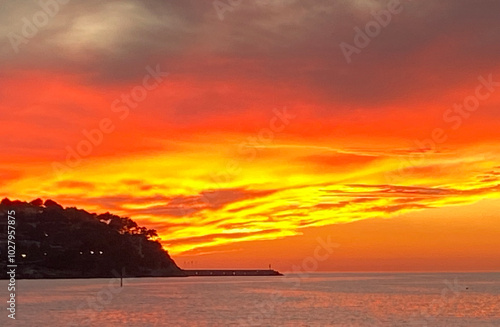 Bright sunset in the sea. Santa Ponsa. Mallorca Island. Spain