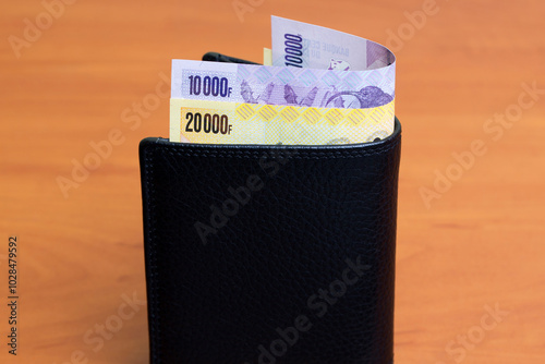 Congolese Franc in the black wallet