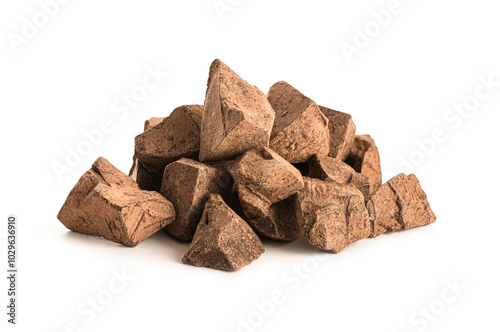 Pile of cocoa mass isolated on white background.