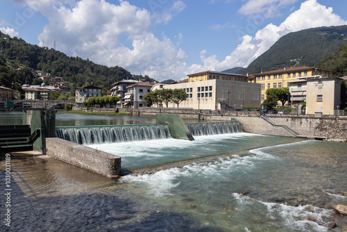 View of a Hydroelectric weir on the Brembo River at San Pellegrino Terme, in Lombardy, Italy.