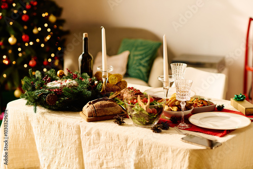 Delicious festive food on table, wine and bread.