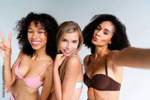 Photo of attractive young girls together posing take selfie photo have fun sensual model wear lingerie isolated studio background no filter