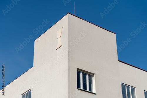 Building of Hus's choir in Nusle was designed in 1934 as a multi-purpose building. It is a relatively simple rectangular building with a slightly raised prismatic turret on the street corner.