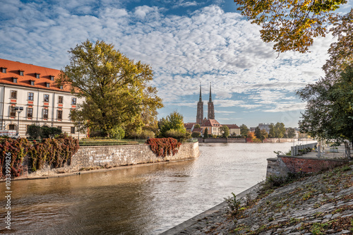 Scenic Riverside View with Historic Architecture in Autumn, Wroclaw, Poland