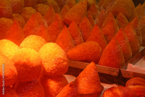 rice balls made with ragu and cheese, also known as arancini or arancine a traditional dish from southern Italy's island of Sicily