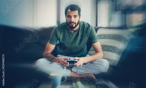 Man, portrait and video gamer for esports, fun and relax in home for entertainment as online player. Male person, controller and living room on weekend for competition, challenge and virtual reality