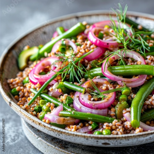 A delightful mix of chilled buckwheat crunchy green beans and vibrant red onions topped with a drizzle of tangy lemon dressing.