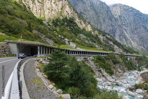 Swiss landscape with the Reuss River, road up the Gotthard Pass