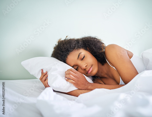 Woman, relax and sleeping with pillow on bed for weekend, holiday or morning under duvet at home. Young, female person or asleep with fabric or blanket in comfort for snooze, rest or nap in bedroom