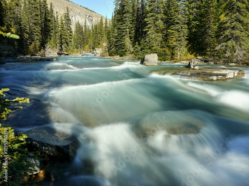 Mountain glacier river in canadian rockies, beautiful wild nature