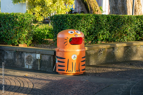 Public rubbish bin (trash can, garbage bin) with cat design motif for Kuching, meaning Kucing or Cat.