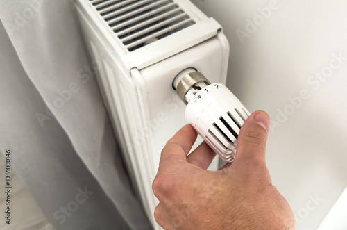 turning down thermostat on radiator to save energy due to heating cost price hike