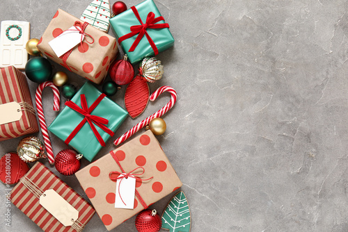 Composition with beautiful Christmas gifts, decorations and cookies on grunge background