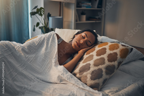 Woman, night and sleeping in bed for tired, comfort and exhausted in home with blanket and pillow. Female person, fatigue and asleep in bedroom for nap, dream and burnout with relax, peace and break