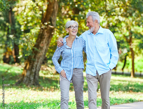 woman man senior couple happy retirement together elderly active vitality park fun smiling love old nature wife happiness mature walking holding hands