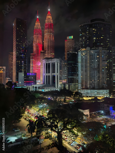 malaysia iconic building kuala lumpur twin tower night view with bustling cars on the road