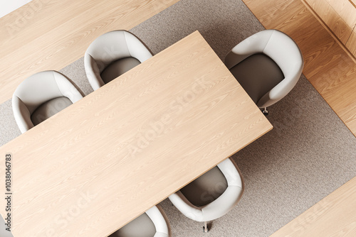 Top view of office meeting room interior with wooden table and chairs in row