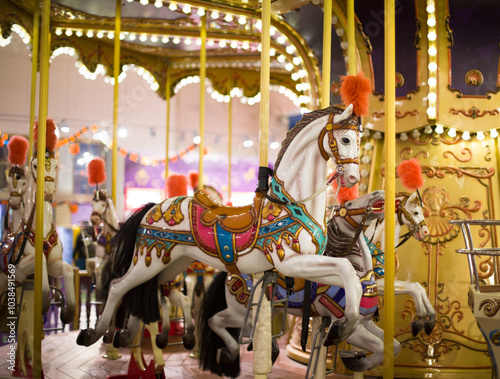 Carousel with Colorful Horses at a Fairground