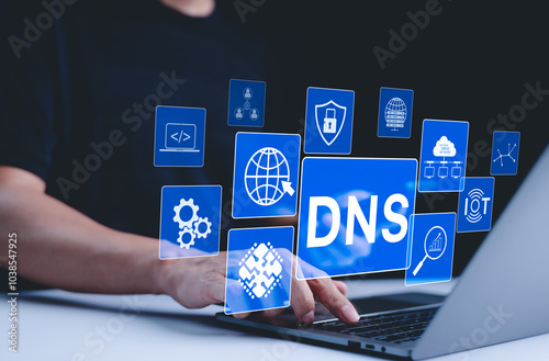 DNS domain name system and web server network system concept. A person uses a laptop, with DNS and web network icons representing domain name system, cybersecurity, and global internet connections.