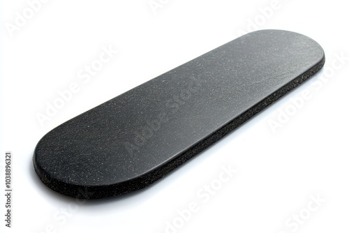 Solitary black emery board on white backdrop