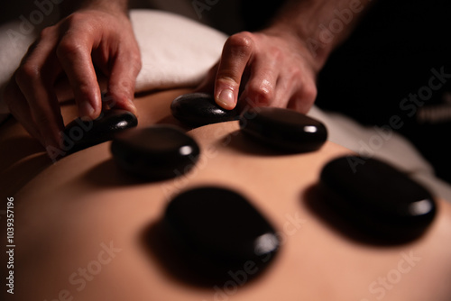 hot stone massage, spa treatment, relaxation, wellness therapy, body care, back massage, holistic healing, professional massage, health spa, stress relief, hot stones, luxury spa, body therapy