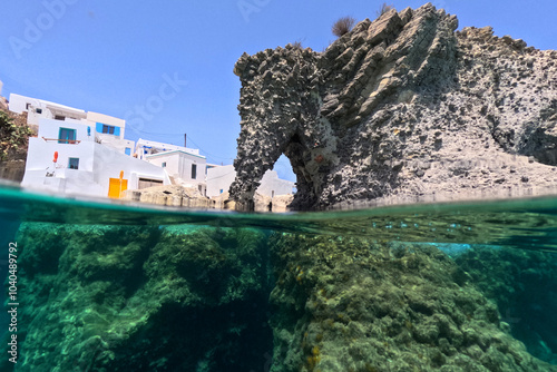 Underwater split photo of famous elephant rock in picturesque Goupa seaside area with crystal clear sea in island of Kimolos, Cyclades, Greece