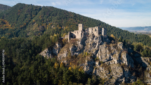 Aerial view of medieval caste Strecno in the autumn mountain landscape, Slovakia