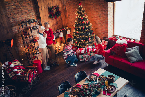 High angle view full size photo of big full family hug open gifts gather celebrate christmas home apartment indoors