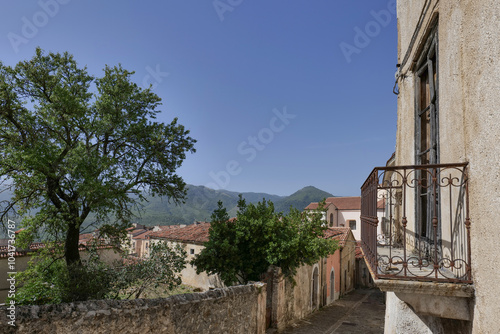  A small street among the old houses of a Moliterno, small town in Basilicata, Italy.