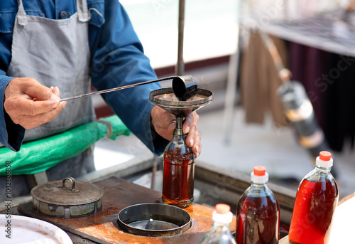 Street vendors selling sesame oil