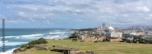 view of downtown old san juan puerto rico (historic buildings spanish colonial architecture) caribbean sea waves travel tourism island 