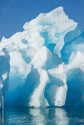 View of glaciers and icebergs in the fjords of South Greenland.