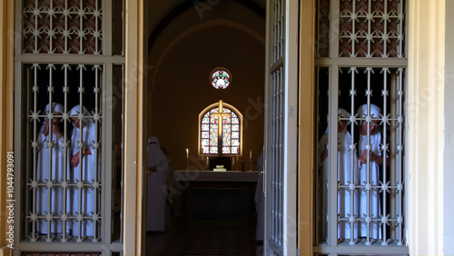 Palermo, Italy, September 03, 2017, Monastery of Santa Caterina, cloistered grates of the nuns for participation in mass with an open missal in the foreground