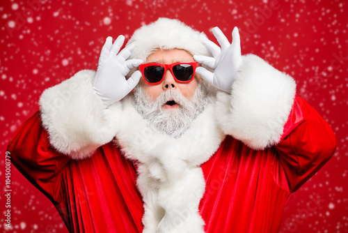 Close up photo of impressed funny santa claus have bad sight wonder incredible festive bargain wear stylish trendy white gloves isolated over red background