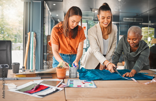 Happy, women and cutting fabric as fashion designer at office with patterns or clothes on project . Startup, employees and creative director with teamwork, collaboration or coworking as stylist