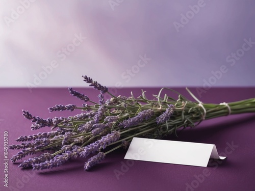 Lavender branches with blank label on purple surface.