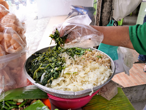 photo of slices of various boiled vegetables used to mix gado gado