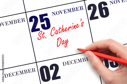 November 25. Hand writing text St. Catherine's Day on calendar date. Save the date. Holiday. Important date. Day of the year concept.