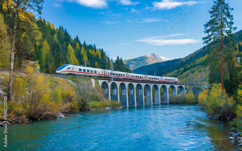 A high-speed train crossing a scenic viaduct over a river, with vibrant forests and mountain ranges stretching out on either side under a clear sky.