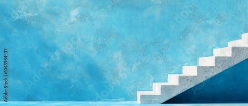  A blue wall features a ascending white staircase, culminating atop more blue wall in the background